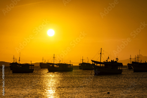 Landscape themes: Fishing boats in Juan Griego Bay at sunset. Margarita Island, Venezuela. photo