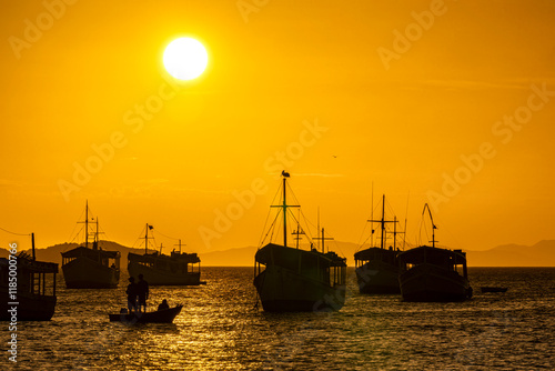 Landscape themes: Fishing boats in Juan Griego Bay at sunset. Margarita Island, Venezuela. photo