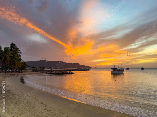 Colorful and beautiful sunset in Juan Griego Bay. Margarita Island, Venezuela. photo