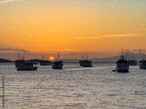 Landscape themes: Fishing boats in Juan Griego Bay at sunset. Margarita Island, Venezuela. photo