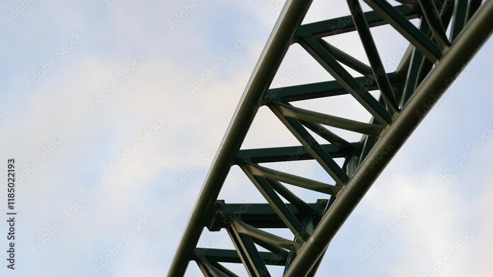 Roller coaster passing on rails at high speed Roller coaster passing on rails at high speed