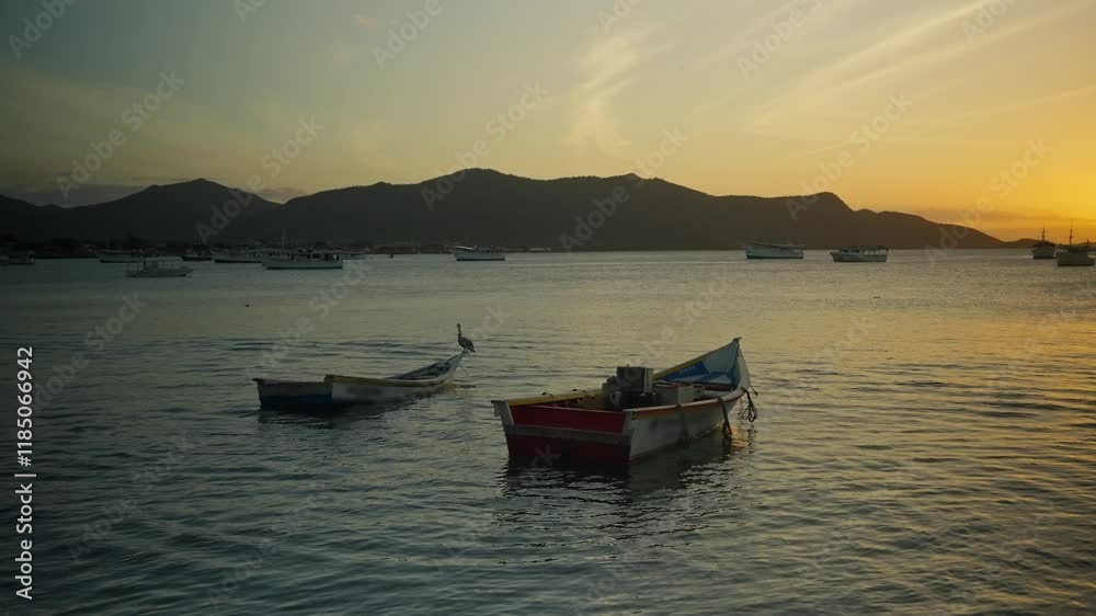 Fishing boats during a beautiful sunset in Juan Griego beach, Margarita Island. Venezuela Fishing boats during a beautiful sunset in Juan Griego beach, Margarita Island. Venezuela