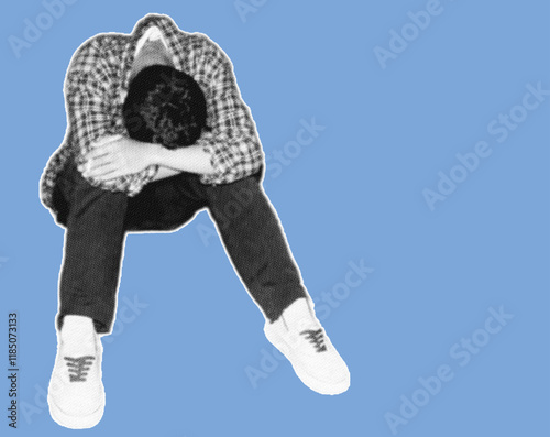 a young man sat with his knees bent and his head bowed in depression pixelate grayscale color halftone dotted texture style collage element isolated on blue background