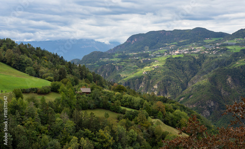 Beautiful houses and farms dot the hillsides of Tyrollean Italy in the Dolomites.