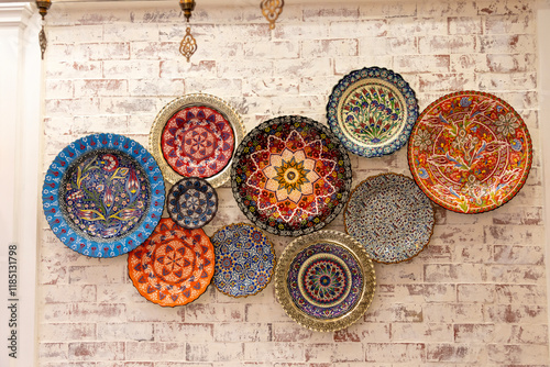 Arabic painted ceramic plates hanging on the wall.