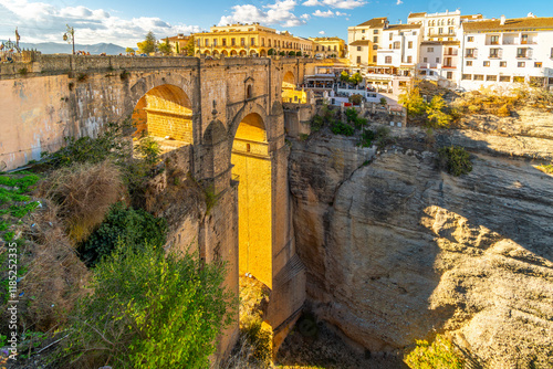 The Puente Nuevo, the old stone bridge spanning the El Tajo gorge in the mountaintop white village of Ronda, in the Malaga province of Southern Spain.	