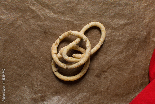 Top view of fried corn rings snack, Overhead view of nigerian kokoro egba corn snack photo