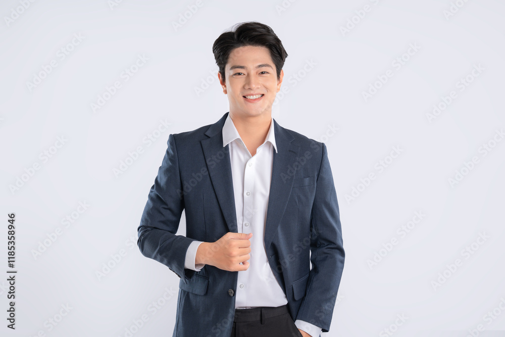 Portrait of young Asian business man posing on white background Portrait of young Asian business man posing on white background