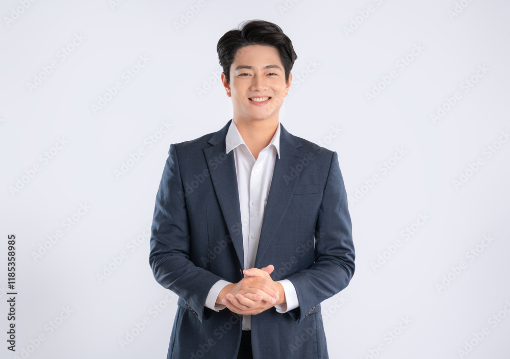 Portrait of young Asian business man posing on white background Portrait of young Asian business man posing on white background
