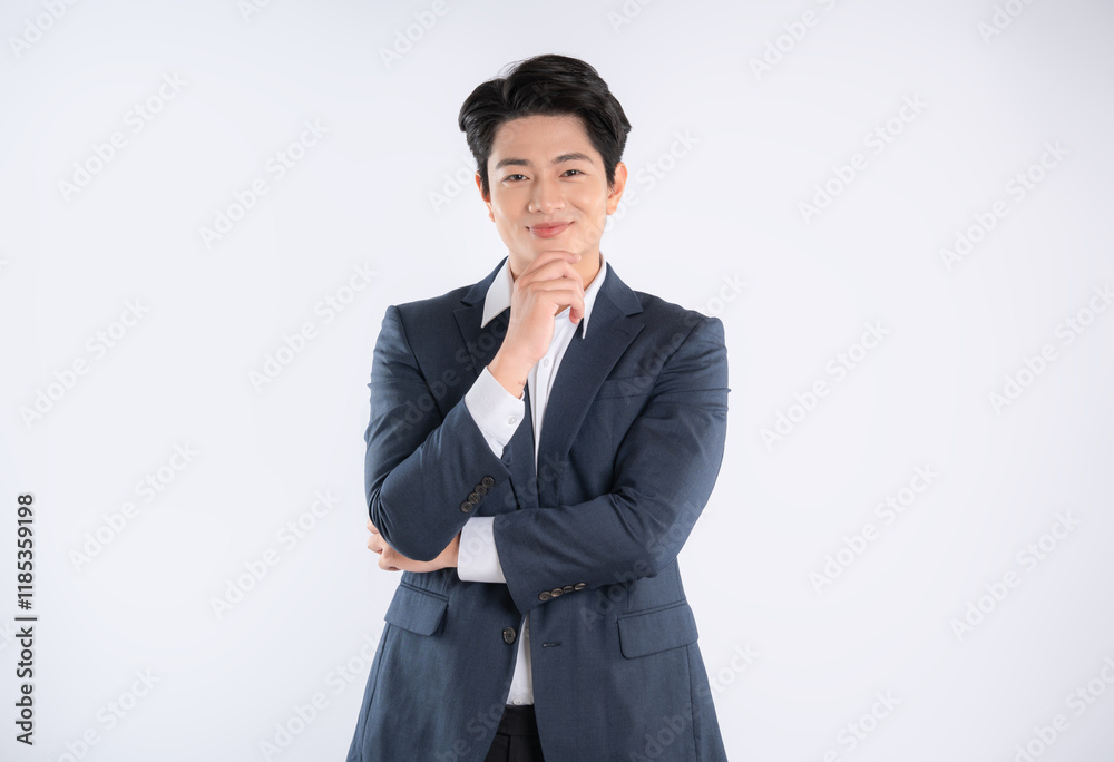Portrait of young Asian business man posing on white background Portrait of young Asian business man posing on white background