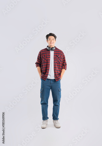 Full body image of young dynamic Asian man posing on white backgroundmage photo