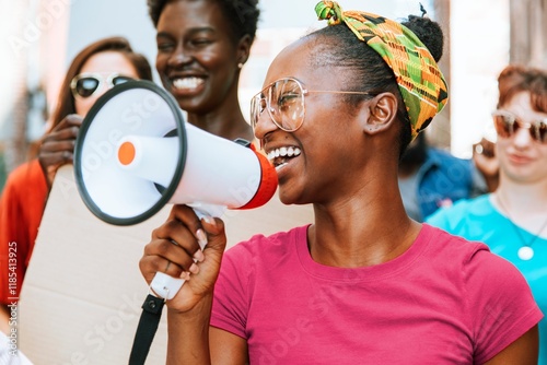 African-American holding megaphone, peaceful protest photo