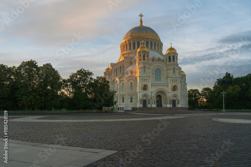 The Naval cathedral of Saint Nicholas in Kronstadt (Morskoy Nikolskiy Sobor) and the Anchor (Yakornaya) Square on a sunny summer morning, Kronstadt, St. Petersburg, Russia photo