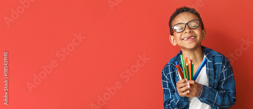 Cute African-American boy w...