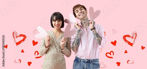 Young couple with paper hea...