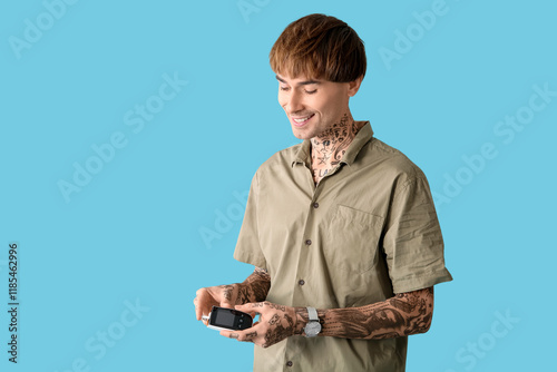 Diabetic young man using gl...
