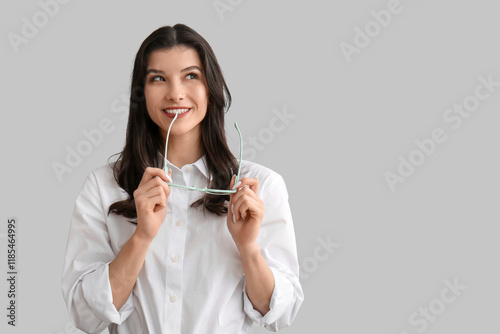 Happy smiling young woman h...