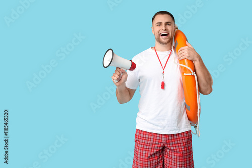 Happy young lifeguard with ...