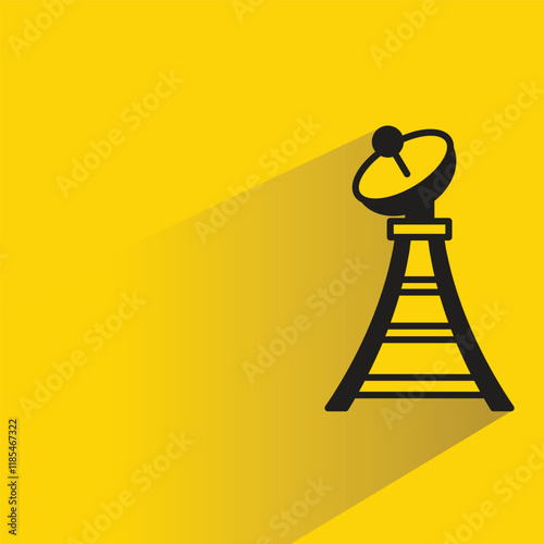 antenna tower with shadow on yellow background