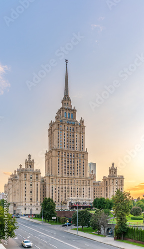 Wallpaper Mural High-rise stalinist building near river at summer sunset in Moscow, Russia. Historic name is Hotel Ukraine. Torontodigital.ca