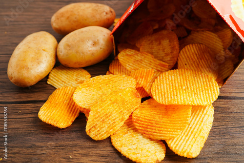 Potato chips , delicious BBQ seasoning spicy for crips, thin slice deep fried snack fast food. photo