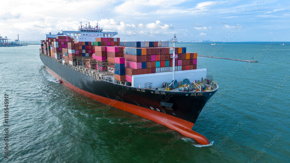 Fototapeta premium Aerial side view of cargo ship carrying container and running for export cargo yard port to custom ocean concept technology transportation , customs clearance, webinar banner forwarder mast