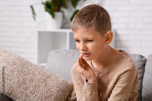Young boy experiencing toot...