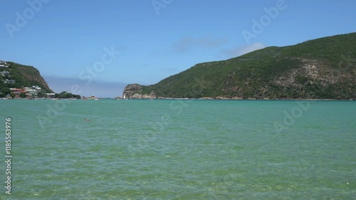 Swimming in the blue lagoon waters of Knysna with the view of the Heads photo