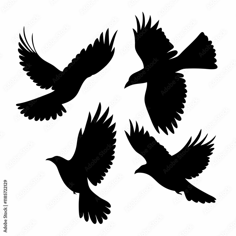 Fototapeta premium Four birds flying in the sky. They are all black. The birds are in different positions. One is in the middle, and the other three are on the right side