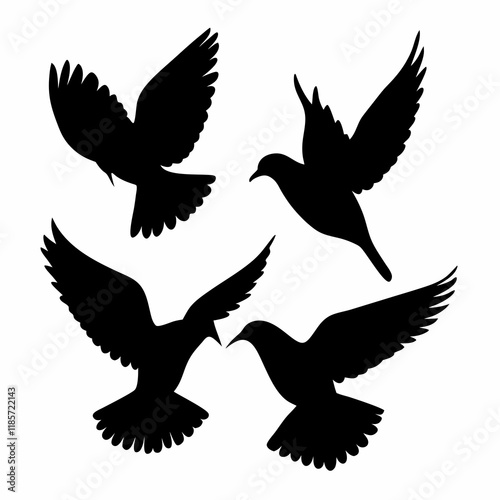 Four birds flying in the sky. They are all black. The birds are in different positions. One is in the middle, and the other three are on the right side