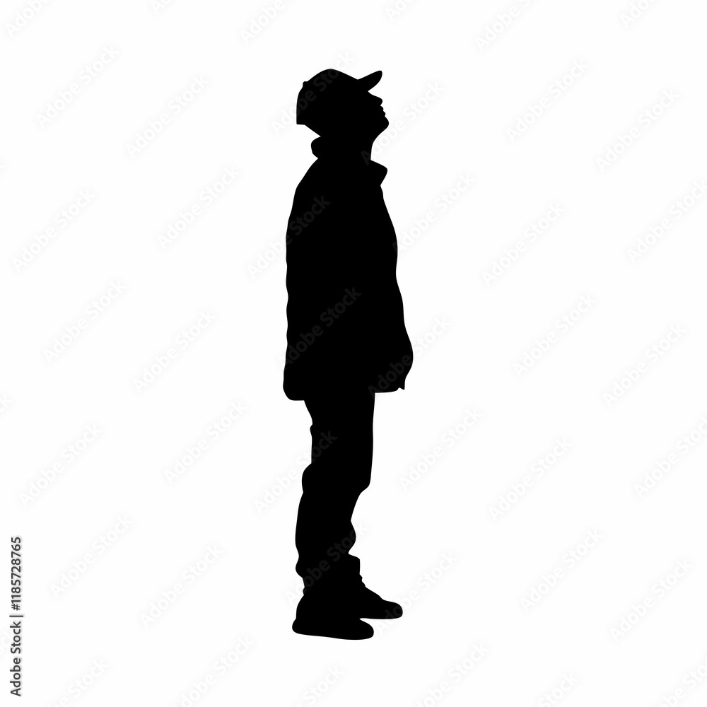 A man is standing in front of a white background. He is wearing a hat and shorts. He is wearing a black shirt A man is standing in front of a white background. He is wearing a hat and shorts. He is wearing a black shirt