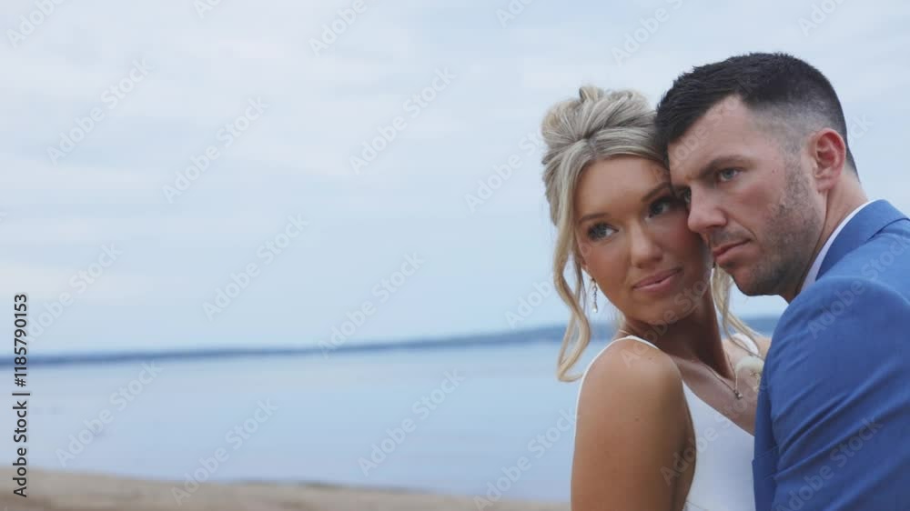 A picture-perfect couple celebrating love on a glowing beach