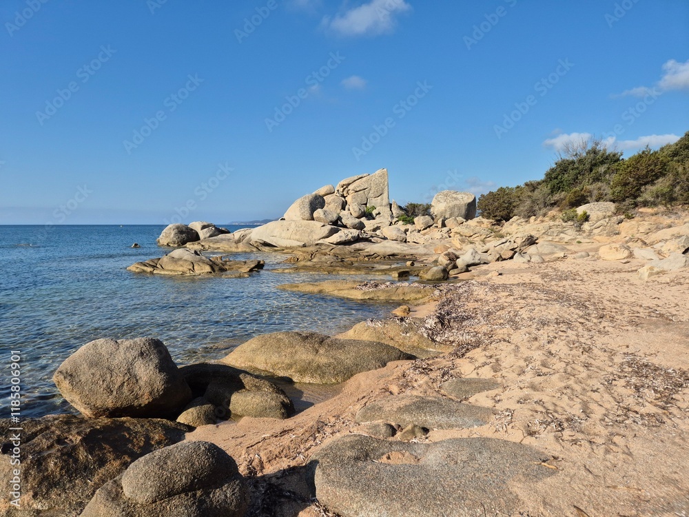 Plage de Tamaricciu, lonesome white beach with turquoise water at a beach in Porto Vecchio, South Corsica.