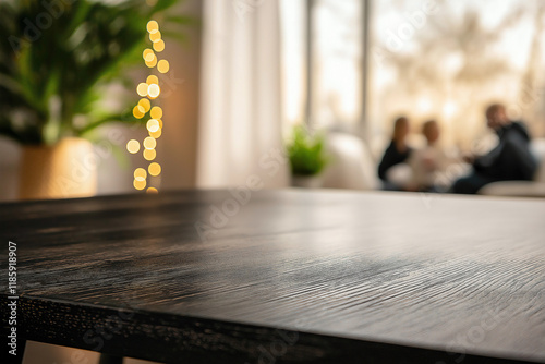 a sleek table with slight scuffs, in a cozy apartment living room. a modest family gathering, with a touch of winter or spring decor around the window.