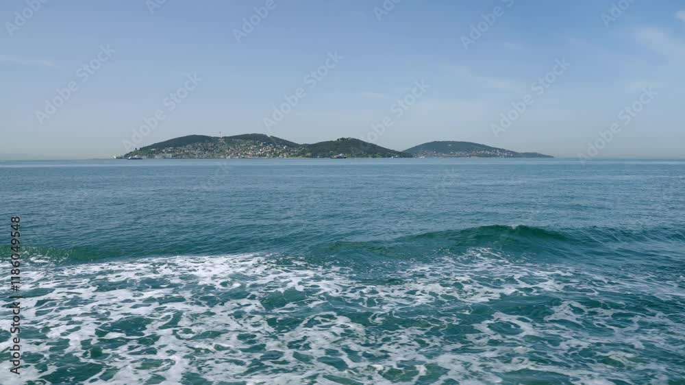 Ferry ride around Istanbul showcases scenic views of islands, blue sea waves. Tourists enjoy travel, explore Turkish landscapes from water. Perfect for leisure, tourism promotional clips. Ferry ride around Istanbul showcases scenic views of islands, blue sea waves. Tourists enjoy travel, explore Turkish landscapes from water. Perfect for leisure, tourism promotional clips.