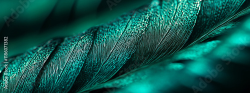 Detailed close-up of a richly textured green leaf featuring deep veins and a layered organic pattern, creating a vibrant natural composition.  
 photo