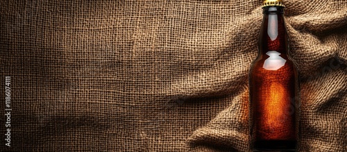 Beer bottle on burlap with ...