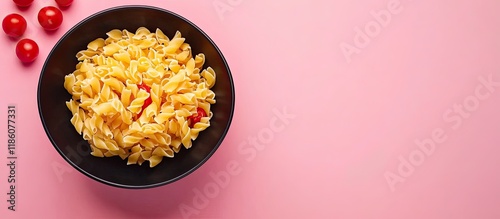 Bowls containing raw pasta ...