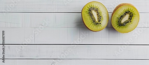 Two halves of kiwifruit on ...