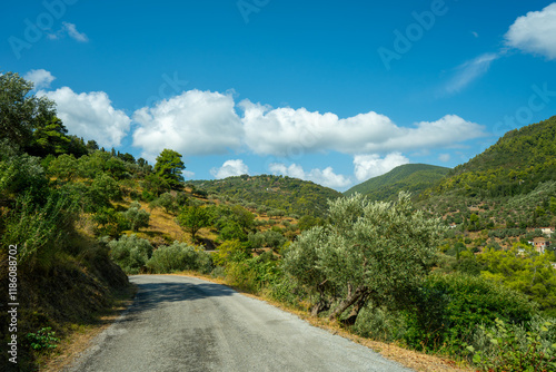 View of the sea, mountains, rocks, beaches, islands and the sky from different sides of the Skopelos island Greece.