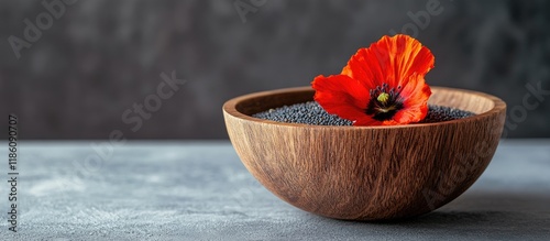 Wooden bowl containing popp...