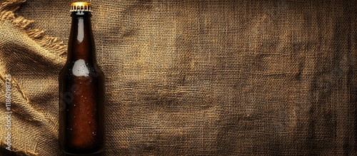 Beer bottle on burlap with ...