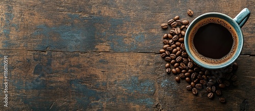 Coffee cup and beans on a r...