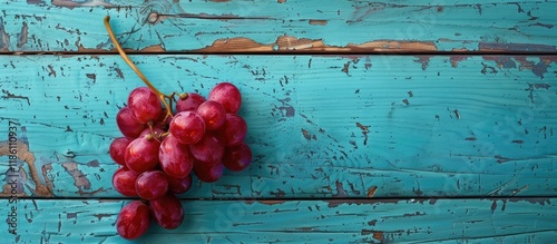 red grape on aged blue wood...