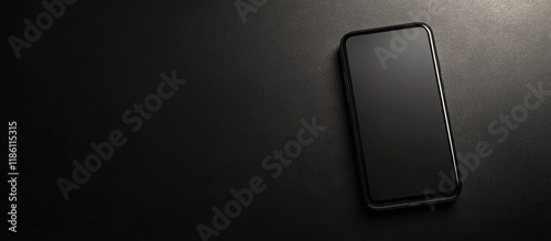 Mobile phone against a blac...