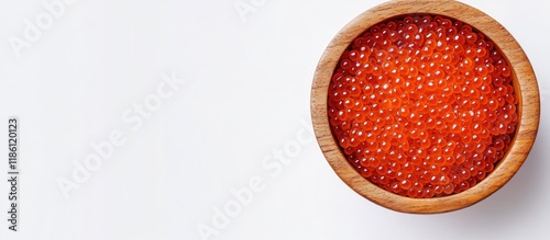 Wooden bowl filled with red...