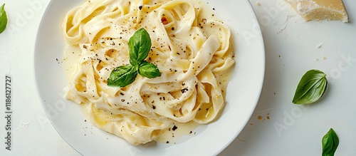 Obraz na płótnie Fettuccine Alfredo Fettuccine served with a cheese and butter sauce plated with a top view copy space w salonie
