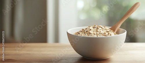white bowl of oat flakes wi...