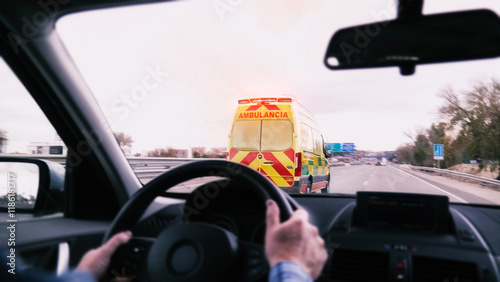 Obraz na płótnie Driver following an ambulance on the highway in madrid w salonie