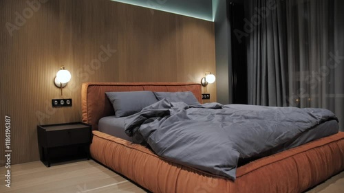 Discover a modern bedroom that embodies a cozy ambiance paired with a stylish design